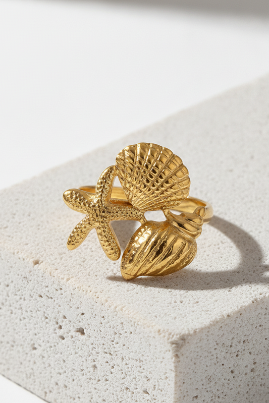 Bague Thalassa en acier inoxydable doré avec coquillages et étoile de mer
