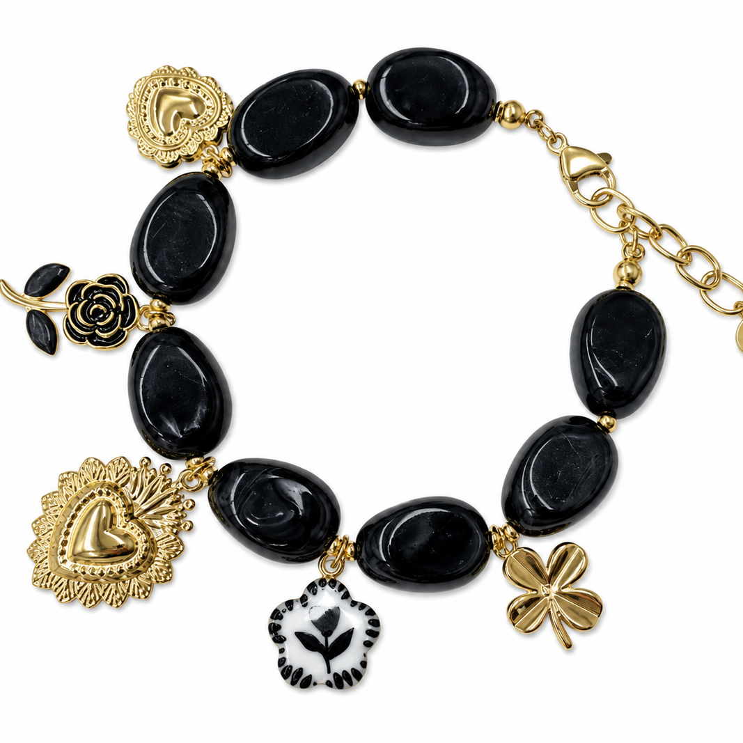 Bracelet doré Perséphone avec pierres noires et breloques
