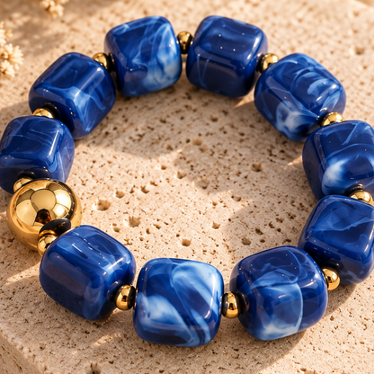 Bracelet fantaisie femme AZURA en résine bleue marbrée avec grosses perles carrées arrondies