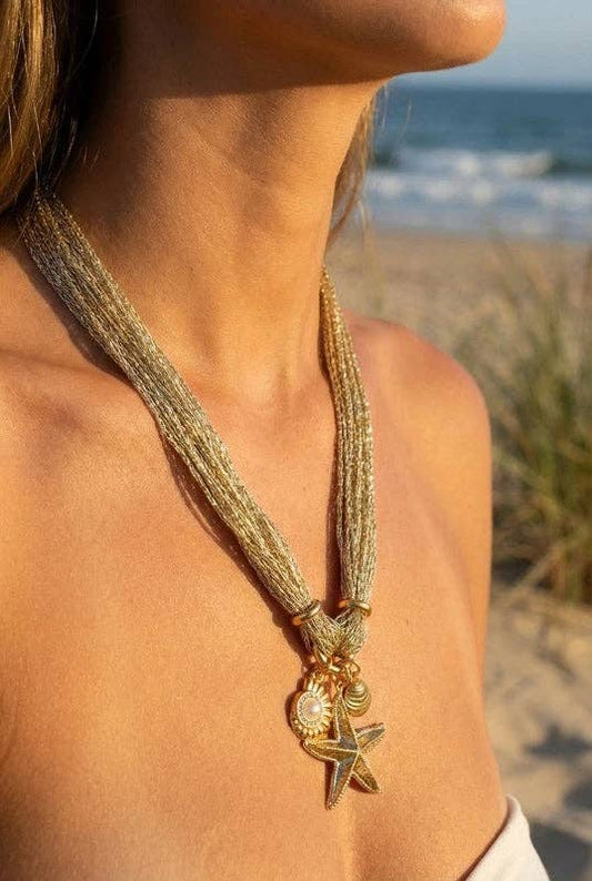 Collier "Océane" - Pendentifs Coquillage & Étoile de Mer en Acier Doré